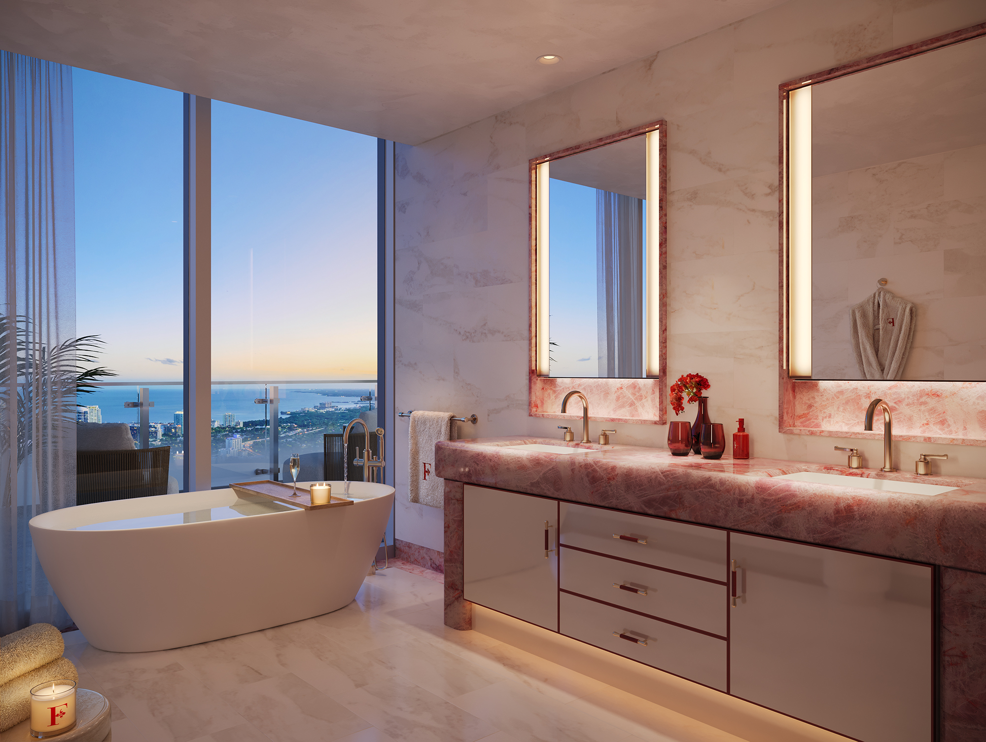 Developer rendering of a Faena Residences Miami primary bath in the warm rose finish, with a rose stone vanity, lit mirrors and a soaking tub facing the bay