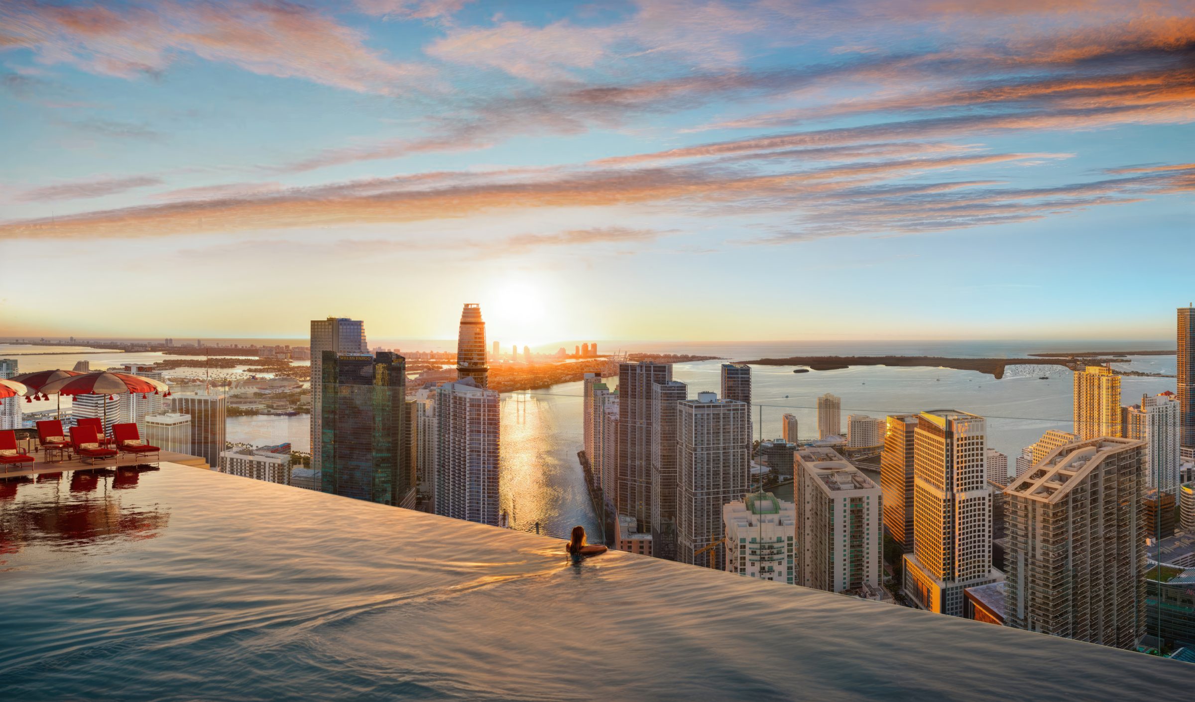 The Faena Rose infinity pool at sunset, above Brickell and Biscayne Bay